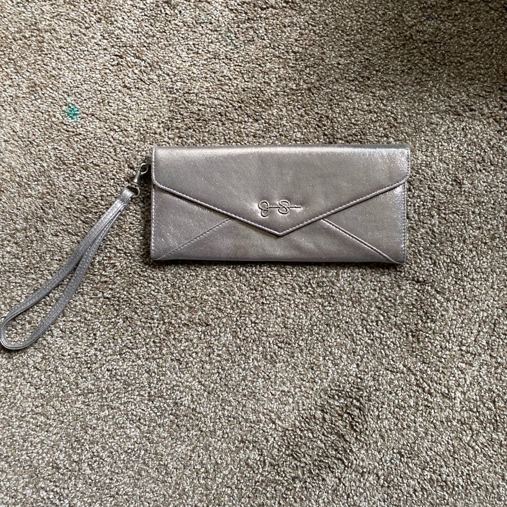 Jessica Simpson metallic silver clutch with strap